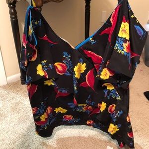 Sleeveless floral ruffled cami.